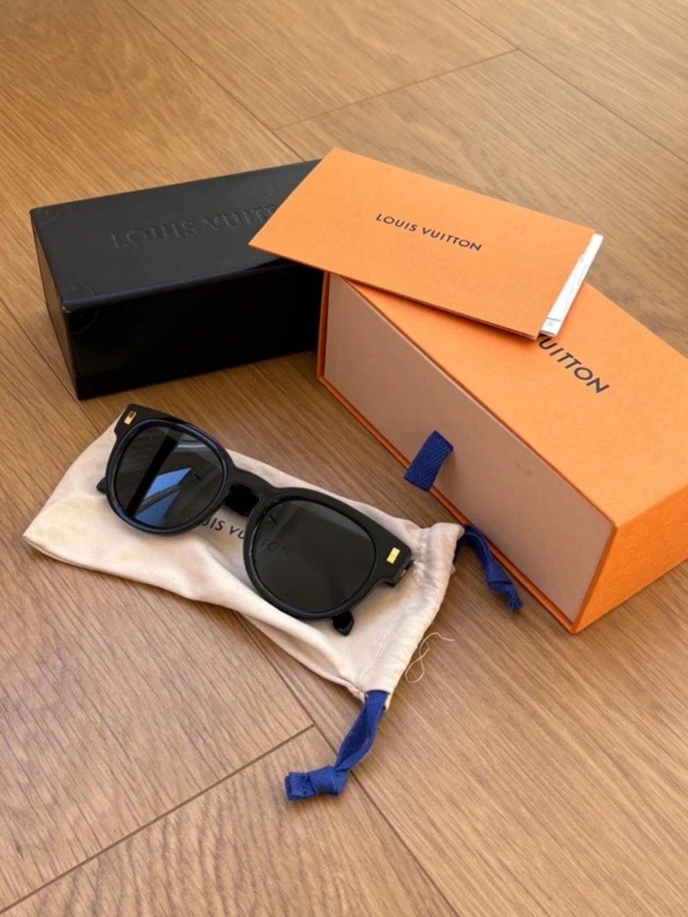 Louis Vuitton Black Round Sunglasses with Gold Accents